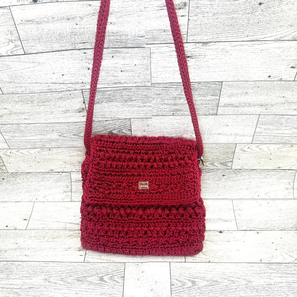 The SAK Red Crochet Lined Purse w/Crossbody Strap & Foldover/Zip Closure